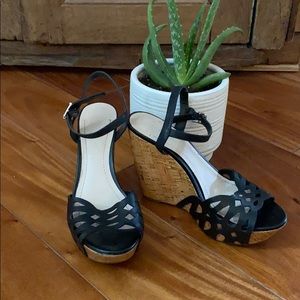 Used BCBGeneration wedge black heels
